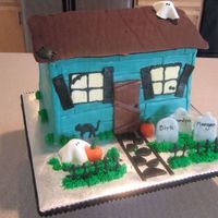 Haunted House Made this for a family who was celebrating 3 birthdays around this time (hence the names on the tombstones.) Choc. cake. Siding, door,...