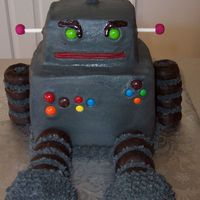 Robot Cake Robot cake made for a 3 year old's birthday. Body is 2 6 inch square cakes stacked, head is a smaller square cut from a 6 inch cake,...