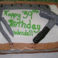 Carpenter Cake This was my first attempt at mmf on a cake.. DH says the hammer head was too large but needless to say i'm no artist. It was 1/4...