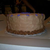 Chocolate Cake Again made for friends. Chocolate cake with 3 layers of peanut butter filling. Chocolate buttercream and RI flowers.