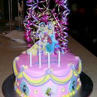 Disney Princess This is an 8" cake, all buttercream. Edible image plaques were prepared as described in the tutorial here at CC. The flowers are made...