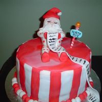 Wilton Course 3 Final Cake The idea for this cake was santa the night before christmas eve reading his naughty nice list and fell asleep in his pj's. The details...
