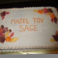 Fall Bat Mitzvah Cake for fall Bat Mitzvah with leaves made of fondant and dusted with luster dust.