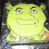 Shrek Cake Here is a cake i did for my nephew's birthday. I tinted my white almond cake lime green so when you cut the cake it is green too.