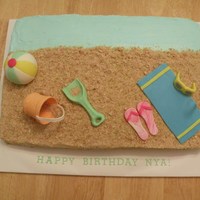 Beach Theme Chocolate cake with fondant and gumpaste decorations