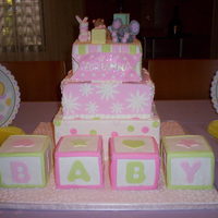 Baby Shower Blocks Vanilla square cakes. The blocks are also vanilla, all covered in homemade fondant. The little figures are made of gumpaste as well as the...