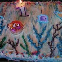 Nemo Cake This is my son's first birthday cake; a double chocolate chip cake with cream cheese frosting. I purchased the Nemo set from a local...