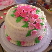 Coconut_Cake__Pink_Flowers_2.jpg Coconut with coconut filling and buttercream icing