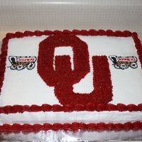 Sooners Cake Chocolate cake with raspberry filling. Color flow wagons.