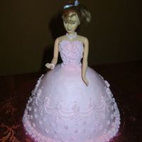 Doll Cake Yellow cake torted with chocolate frosting. This cake was for my mother who is newly into doll collecting.