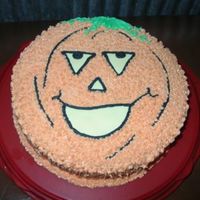 Pumpkin Cake Single layer spice cake with buttercream icing. Fondant features.