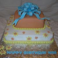 Daisy Cake I was a little unsure of these colors when the customer ordered, but it turned out much better then I thought. Bottom tier is chocolate...