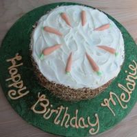 Carrot Cake Triple layer carrot cake with cream cheese filling and frosting. Fondant carrot decorations.