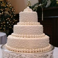 Pearl Wedding The bride wanted pearls/dots everywhere! She even wanted a custom topper of fondant pearls and roses. Handmade pearls brushed with luster...