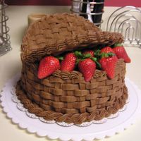 Chocolate Basket Cake I made this cake for my Grandmother's Birthday. The "lids" are cardboard with basketweave.