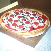 Itzza A Pizza Party!!! Again for my sons 7th birthday... all white cake with buttercream icing and candy mold toppings. I purchased a mold from out local cake...