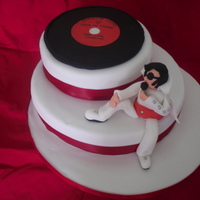 Love Me Tender Wedding Cake version of a birthday cake i have done a few times before. Modelling paste Elvis and record.