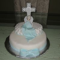 Baptism Cake I made this cake to celebrate my little one's Baptism. It's a butter recipe and It's all covered with fondant. Thank's...