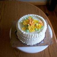 Yellow Roses W/ Tiger Lillies 6" sample cake for a bride to take to her parents. All buttercream.