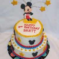 Mickey Mouse Chocolate cake with bc and colorflow accents. The stars are fondant.