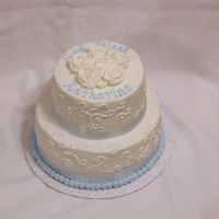 White On White BC with BC flowers, blue organza ribbon on each tier