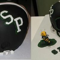 Football Helmet Cake This is a cake I made for a cake decorating contest judged by Duff, the Ace of Cakes. It is a helmet of our local youth football league,...