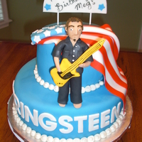 Springsteen Birthday Cake Yellow cake with chocolate icing covered in fondant. Accents are made out of fondant too. Thanks for looking!