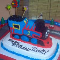 Thomas The Train - 3D 3D Thomas the Train Birthday Cake. Made this for my son's 3rd Birthday. Used the Wilton 3D train pan and tried to make it look like...