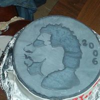 Sammy Hagar Coin Cake Red velvet cake covered in fondant.