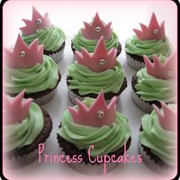 Princess Cupcakes These were for a little girls first birthday party. Since Im a flailer, I injured myself at roller derby practice, and had to do most...