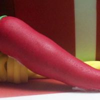 Red Chili 5 of 5: Closeup of a red chili made of modeling paste. As requested by birthday boy it has chili powder kneaded into it.