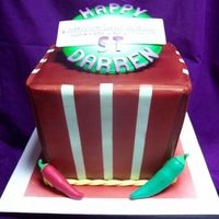 Darren's 21St Birthday Cake 1 of 5: Caramel mud cake with dark chocolate ganache. Two stacked cakes, covered as one. Top is 8inch, bottom is 6inch, carved to get shape...