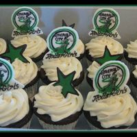 Emerald City Rollergirls Cupcakes These were made for a fundraiser for our local Roller Derby League. The toppers are a chocolate transfer version of their logo.