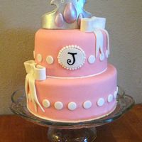 Birthday Cake For A Princess. The little girls mom showed me a photo of a simple pink cake with a monogram and a plastic tiara on top. So I changed the design up a...