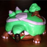 Torterra (Pokemon Character) This cake was created in 3 layers. The top layer was baked in a large Pyrex bowl and the bottom layer was baked in a medium Pyrex bowl. The...