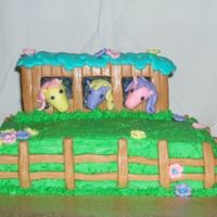 Ponies In The Field The field is chocolate cake covered in buttercream. The barn is vanilla cake covered in fondant. The ponies are fondant.