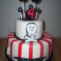 Pirate Yellow cake with fondant. I DO NOT make fondant cakes. EVER I did one in class and that's it. I have done Owen's cake since he...