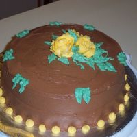 Wilton Cake Decorating Class I First Cake Yellow butter cake with a special chocolate blend with floral decor. My first class cake. Family and friends are excited about being cake...