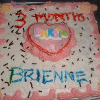 Brienne_3_Months_Bday_005.jpg My first time birthday cake for my 3 month old baby..It's a chocolate cake with vanilla frosting.
