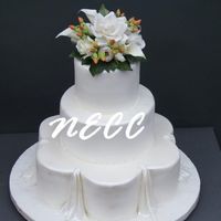 Simplicity I made this back in late Aug. The bride wanted something really simple but elegant and I came up with this design for her. The topper is a...