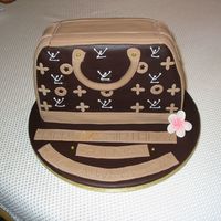 Lv Bag This is the first time I've done an LV bag and found the piping a bit daunting on the cake as it showed up any mistakes on the...
