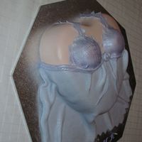 Feminine Lingerie Cake Made this heart shaped cake to give an upper torso shape,then covered in flesh coloured fondant. Textured blue fondant camisole with '...