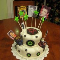 Elvis 8inch, 6 inch cake. Chocolate cake with chocolate fudge frosting.My son turned 9 and is a big Elvis fan. Fondant records and stars.