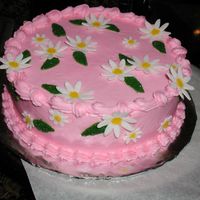 Easterdaisy3.jpg Daisies and leaves were done with Wilton fondant cut and dried over night. Next day I painted them with gel, and dipped in colored sugar.