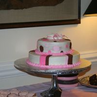 Daughter's Baby Shower This is a cake I did for my daughter's baby shower. It is strawberry cake covered in buttercream with fondant accents.