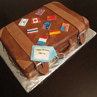 Suitcase Made this cake for a girl who recently took up traveling the world... the flags are all the countries whe's traveled to.