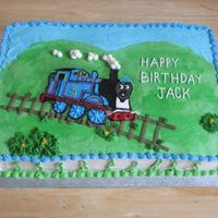 Thomas thomas wearing a kipa and tzitut for a boys 3rd birthday