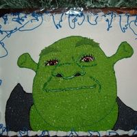 Shrek When I made this cake there was nothing out there anywhere to make a Shrek cake, so I drew him on a sheet cake.