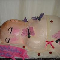 Sleeping Baby The cake is golden butter cake with white chocolate mousse filling and fresh rapberries. The baby is covered in buttercream with mmf and...