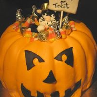 Trick Or Treat Kitty This is a bit of a take-off on all of the pumpkin cakes. I wanted to make the pumpkin look like those "plastic pumpkins" that...